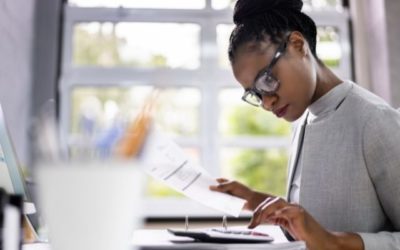 female accountant bookkeeping at a desk